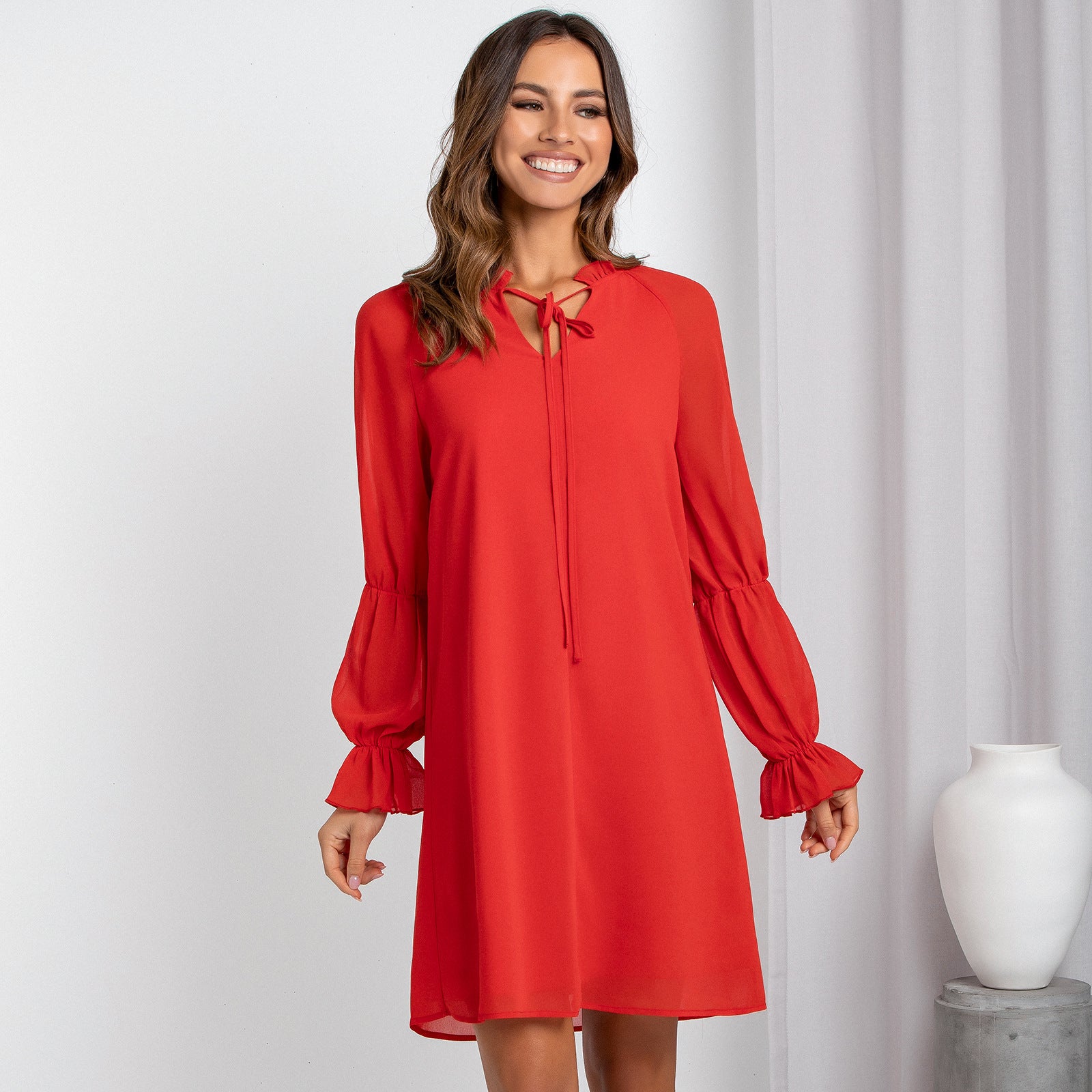 Women's Loose Slim Flared Sleeves Solid Color Hollow Dress
